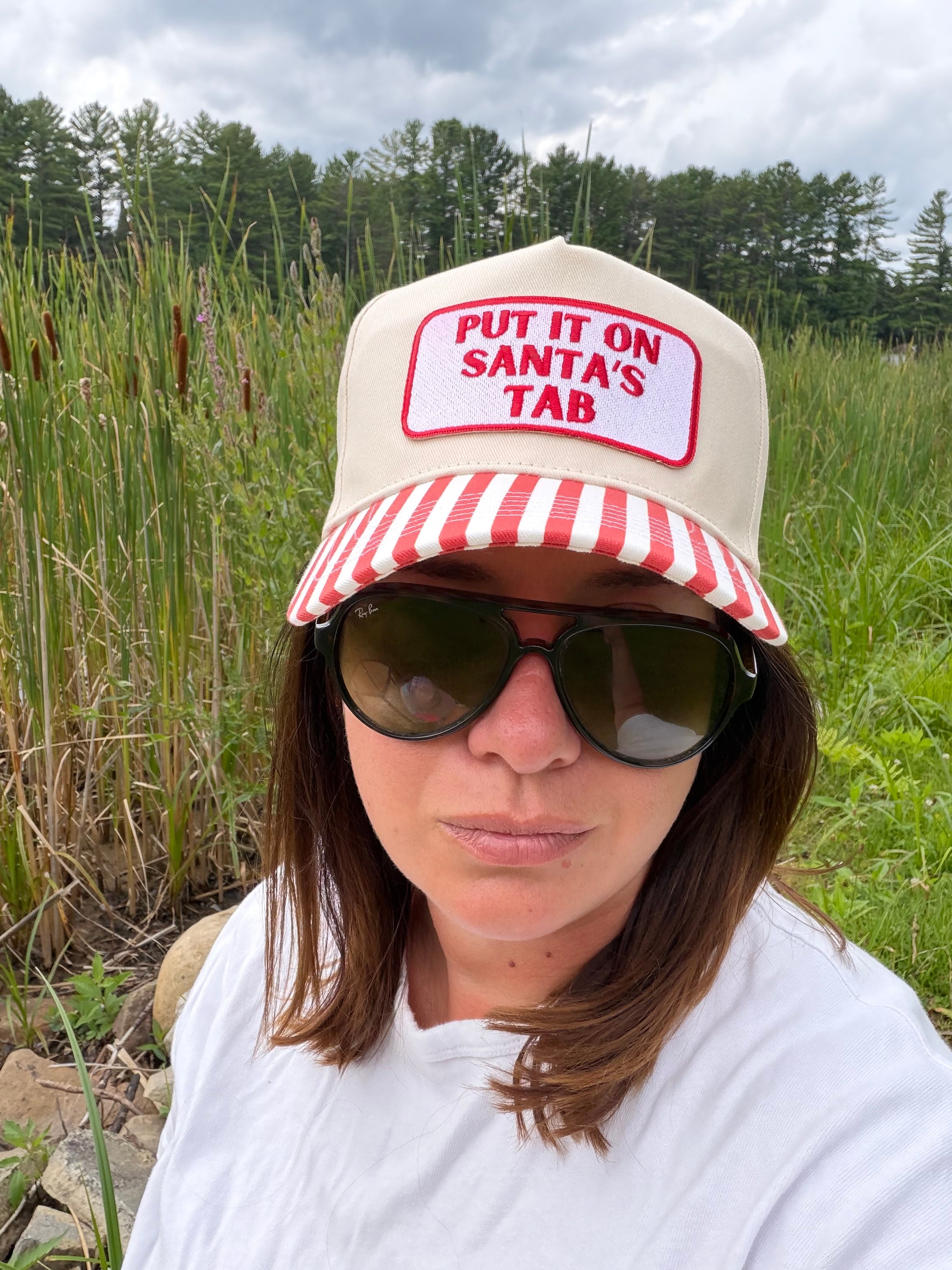 Put It On Santa’s Tab Trucker Hat